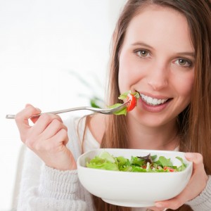 Girl eating salad